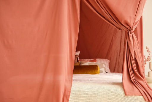 Pink mosquito net canopy