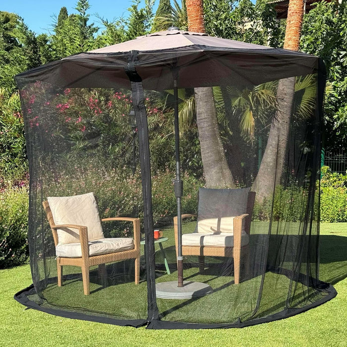 Black umbrella mosquito net covering a patio umbrella, providing spacious insect-free outdoor seating area.