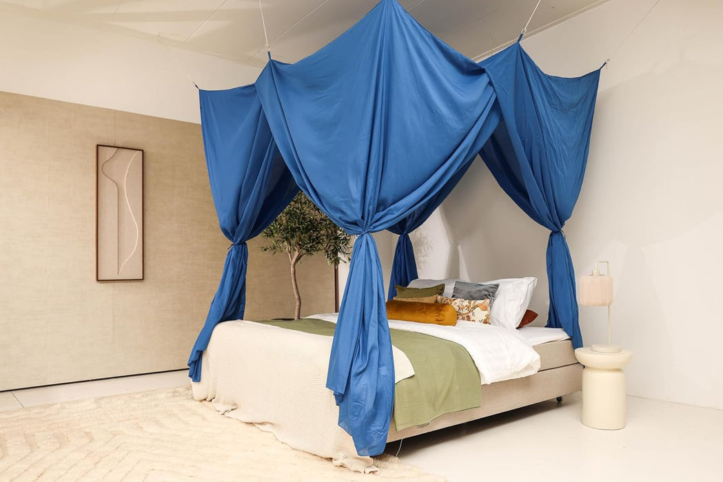 Cotton-poly blue canopy creating relaxing insect-free sleeping area