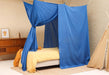 Blue bed canopy covering single bed for elegant minimalist look