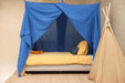 Breathable cotton-poly blue canopy creating peaceful sleep space
