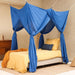 Blue rectangular bed canopy hanging over single bed in modern bedroom