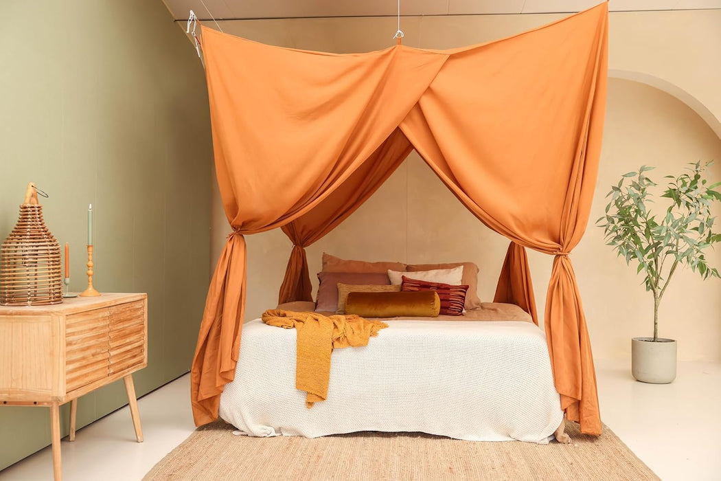 Caramel bed canopy giving full coverage for large bed protection