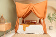 Caramel bed canopy giving full coverage for large bed protection