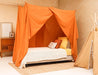 Breathable cotton-poly caramel canopy adding warmth to bedroom design