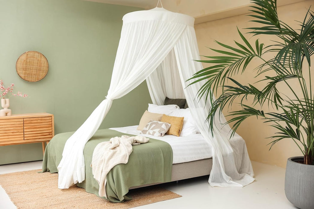 Soft breathable cotton canopy hanging elegantly over bed