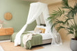 Soft breathable cotton canopy hanging elegantly over bed
