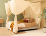 Soft cotton-poly cream beige canopy creating cozy insect-free space