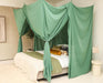Stylish green mosquito net canopy adding elegance to bedroom décor