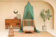 Soft cotton-poly green canopy creating cozy play corner