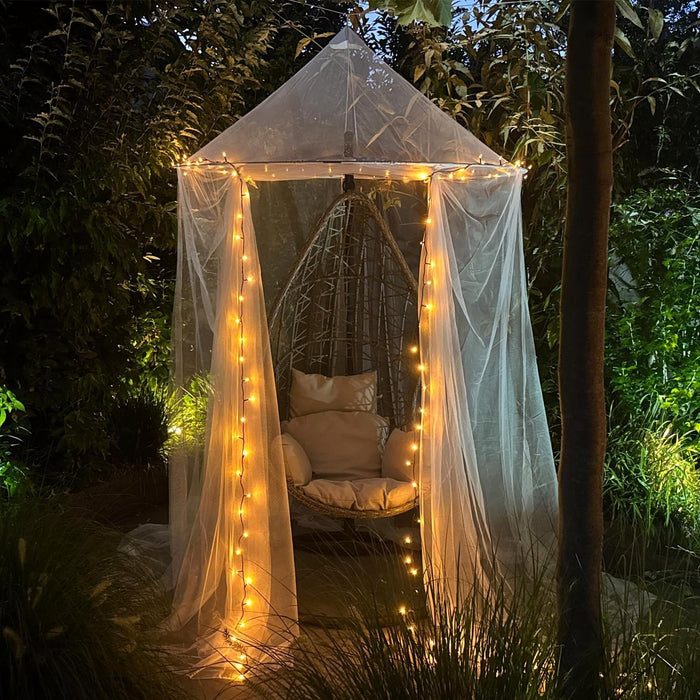 Wide base mosquito net for outdoor patios, offering full coverage and breathable insect protection.