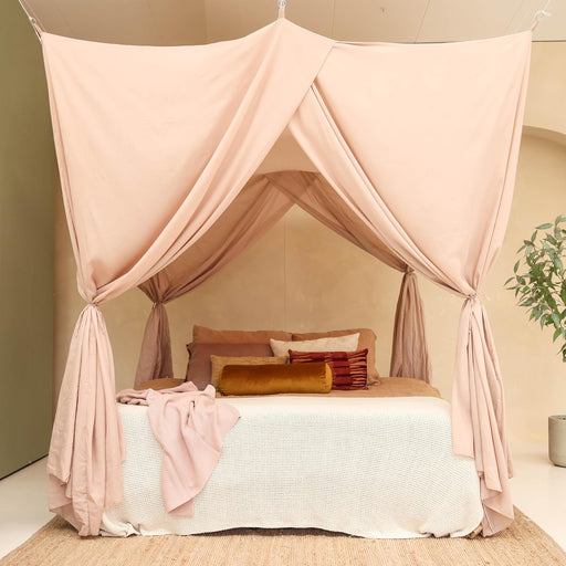 Nougat rectangular bed canopy hanging over Queen size bed in elegant bedroom