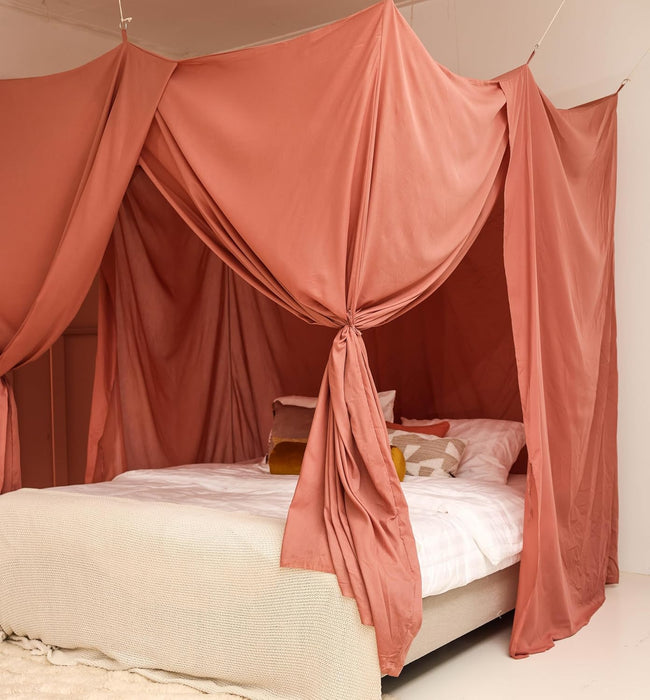Breathable cotton-poly pink canopy adding charm and softness to room