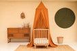 Soft cotton-poly caramel canopy creating cozy play area