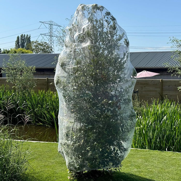 White garden plant netting with drawstring closure for secure and easy installation.